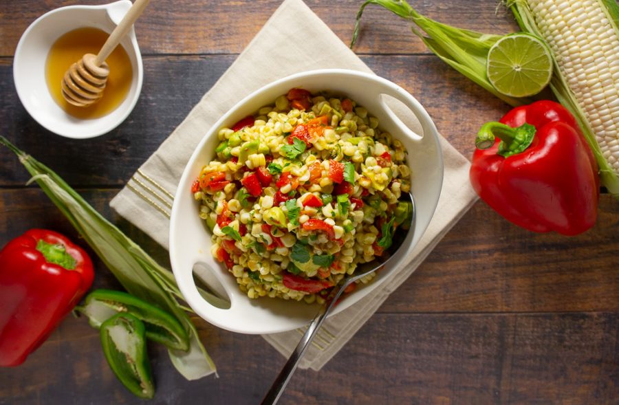 Avocado Corn salad with roasted red peppers in a bowl