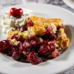 cherry cobbler with whipped cream