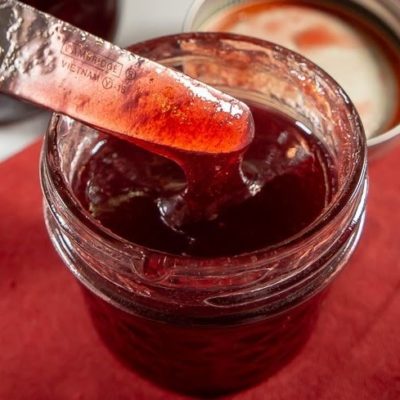 a small jar of pomegranate jelly