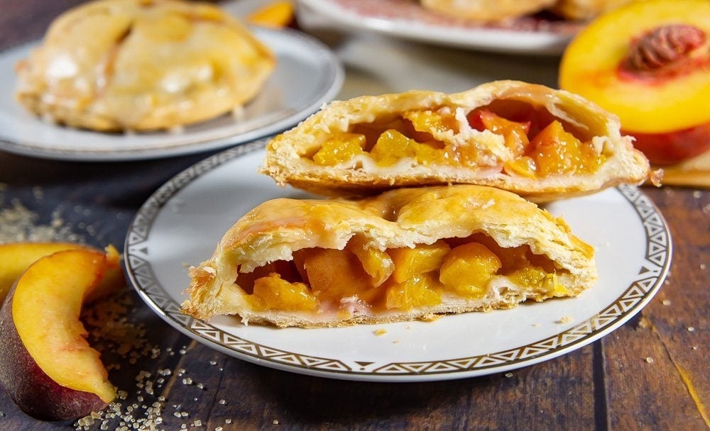 a mini peach pie cut open