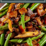 close up of sauteed green beans with bacon and mushrooms