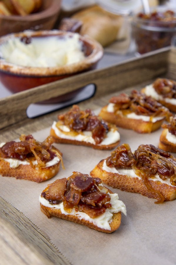 bacon jam crostinis on a serving tray