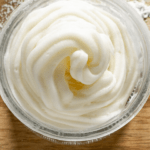 a bowl of cream cheese frosting