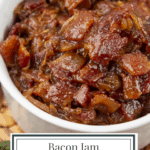 A bowl of bacon jam on a tweed placemat