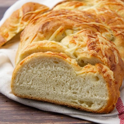 a sliced loaf of asiago bread