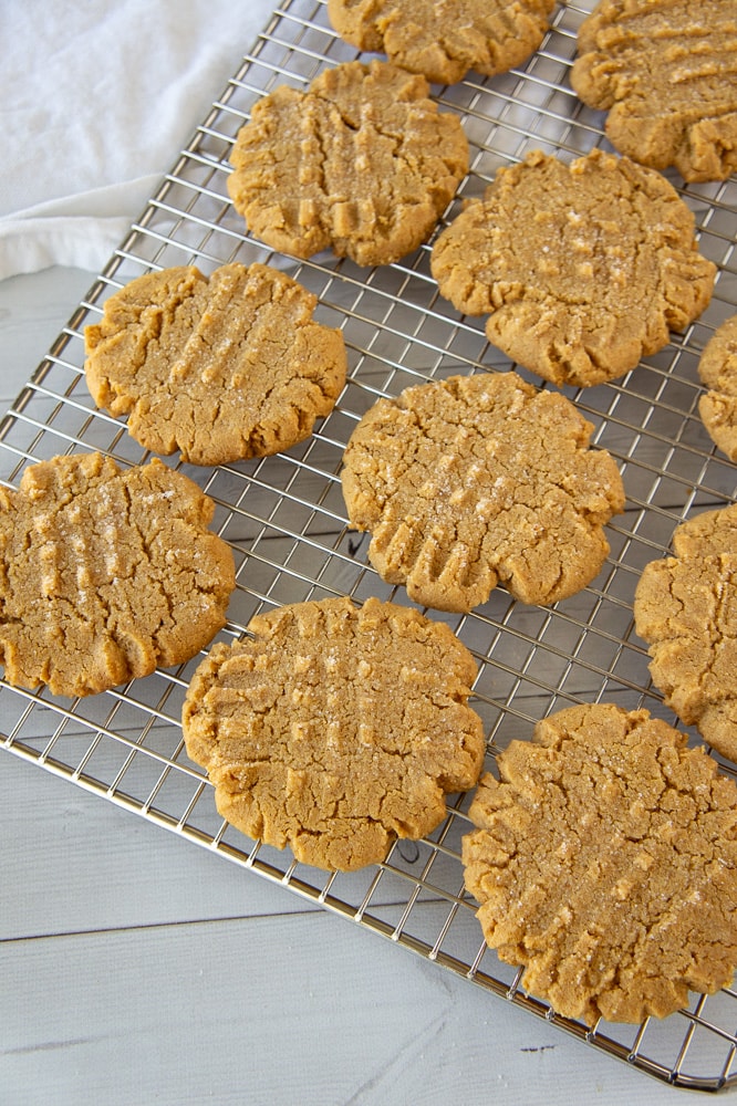 a cooling rack of peanut butter cookies