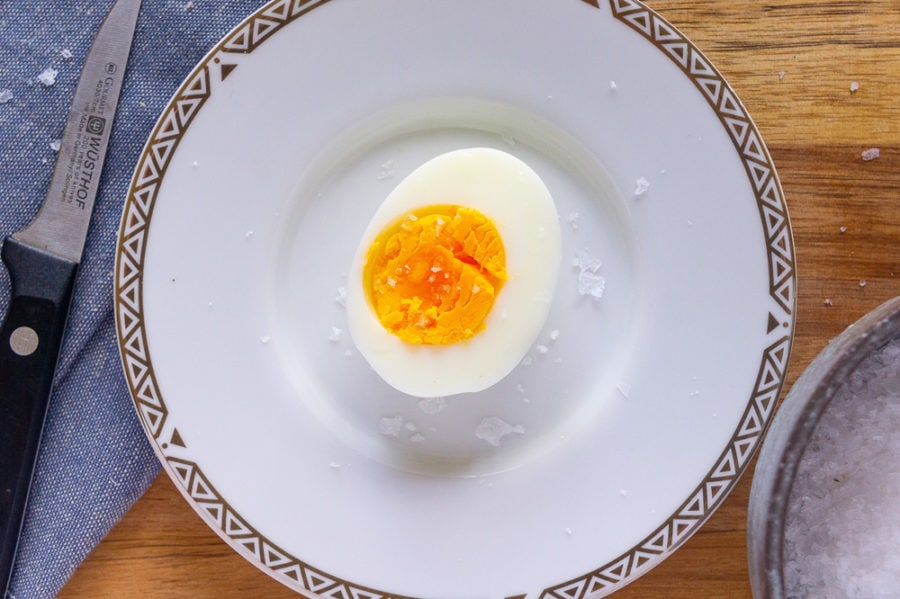 a single half egg on a plate