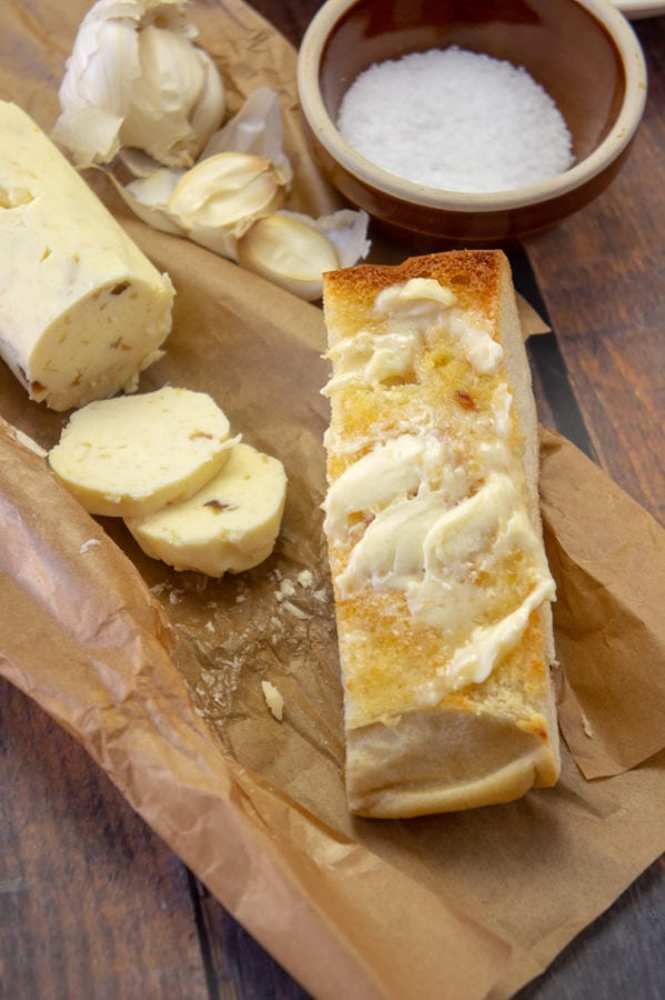 garlic butter smeared onto french bread