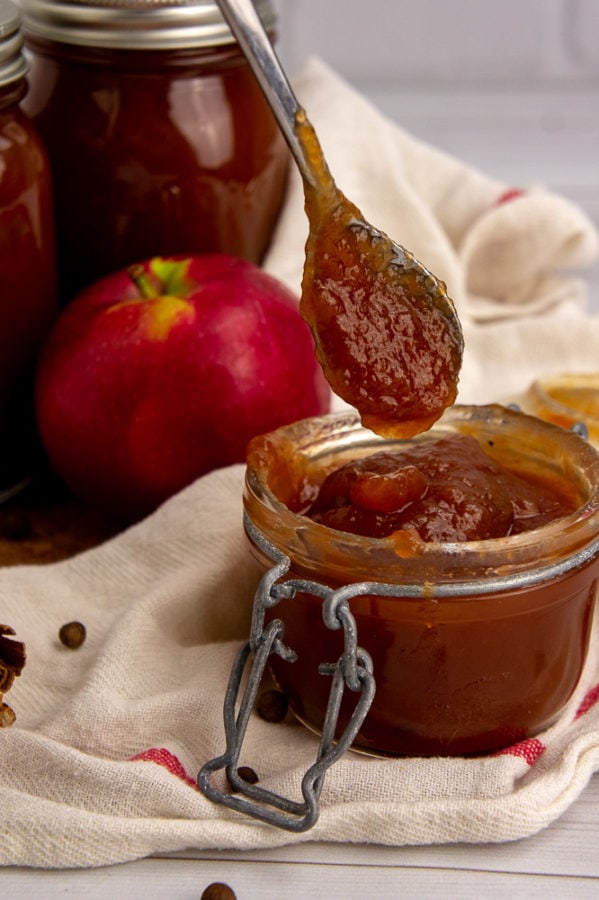 apple butter dropping from a spoon