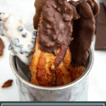 a metal jar of chocolate dipped bacon