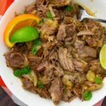 a bowl of shredded mojo pork