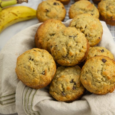 a bowl piled with banana oat muffins