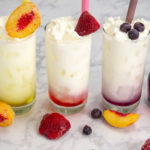 a set of three different colored italian cream sodas