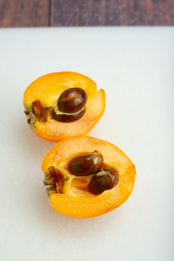 a loquat split in half