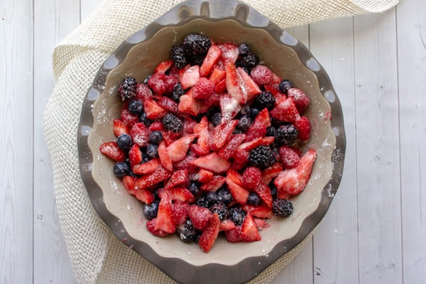 a pie plate of mixed berries with cornstarch