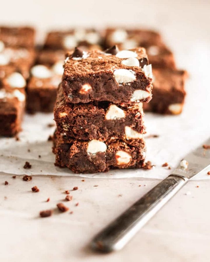 triple chocolate brownies stacked up