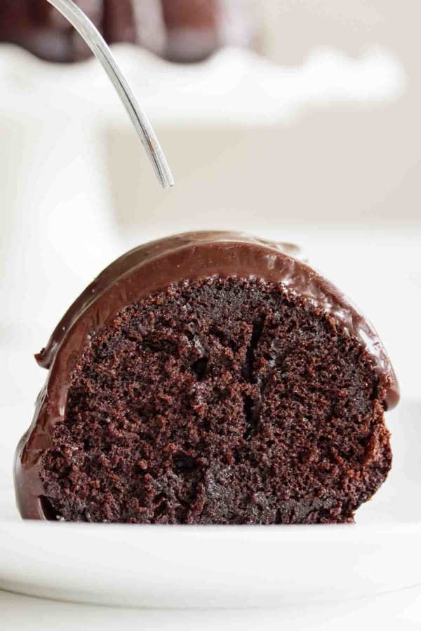 chocolate sourdough cake sliced on a plate