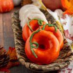 baked pumpkin donuts in a basket