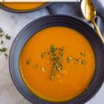 a creamy bowl of honeynut squash soup