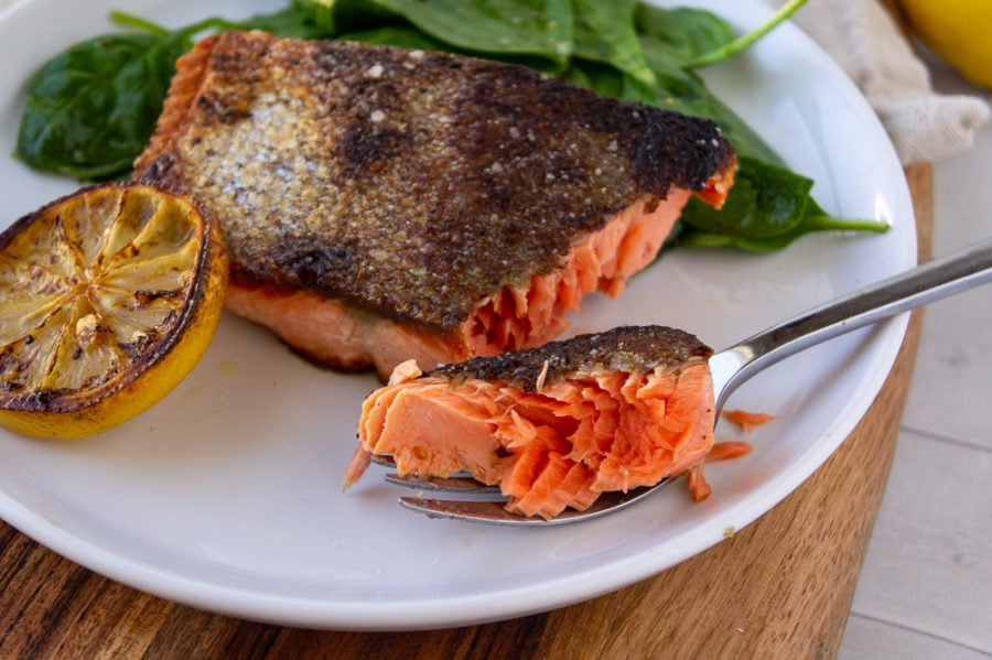 A crisp skinned salmon filet cooked to medium