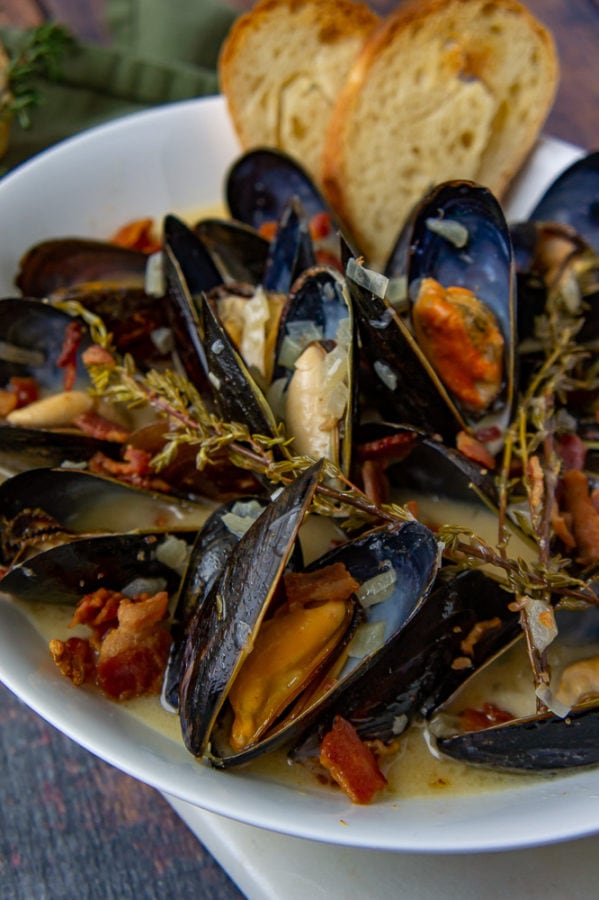 mussles in a cider cream sauce with bacon