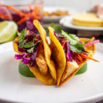rockfish tacos on a white plate