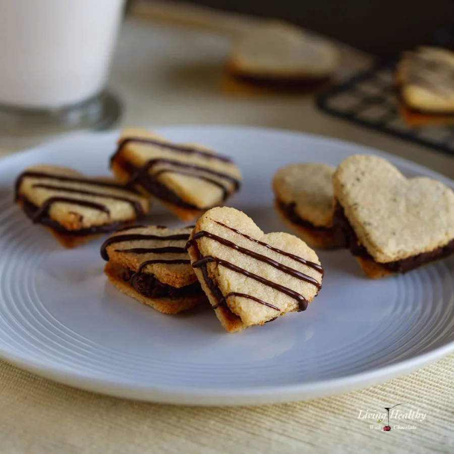 chocolate filled vanilla cookies in heart shapes