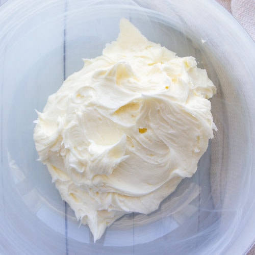 a bowl of white vanilla frosting