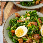 plate of kale and asparagus salad with hard boiled eggs