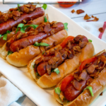 a platter of 4 BLT hot dogs