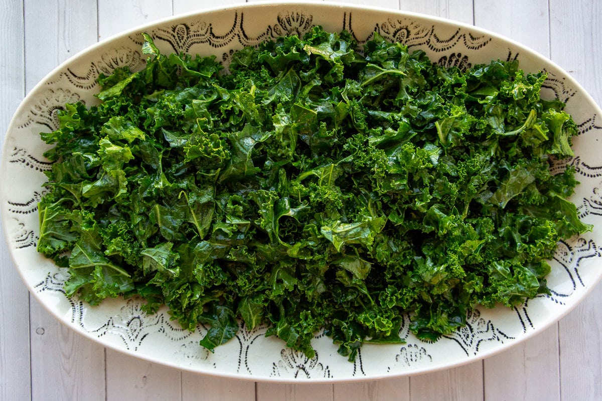 a large platter of massaged kale.