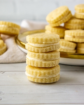 a stack of maple shortbread sandwich cookies.