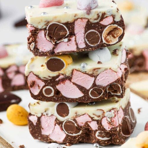 A stack of chocolate slices filled with easter egg candy and marshmallows.